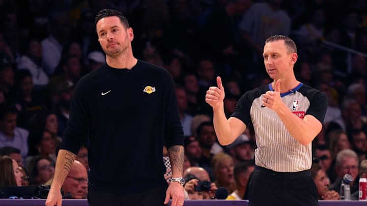 Feb 28, 2025; Los Angeles, California, USA; Los Angeles Lakers head coach JJ Redick reacts to a call by NBA referee Justin Van Duyne (64) during the fourth quarter against the LA Clippers at Crypto.com Arena. Mandatory Credit: Jason Parkhurst-Imagn Images