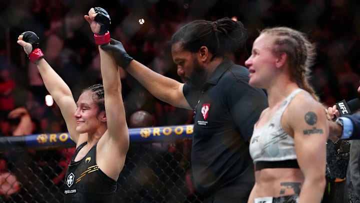 Sep 16, 2023; Las Vegas, Nevada, USA; Alexa Grasso (red gloves) and Valentina Shevchenko (blue