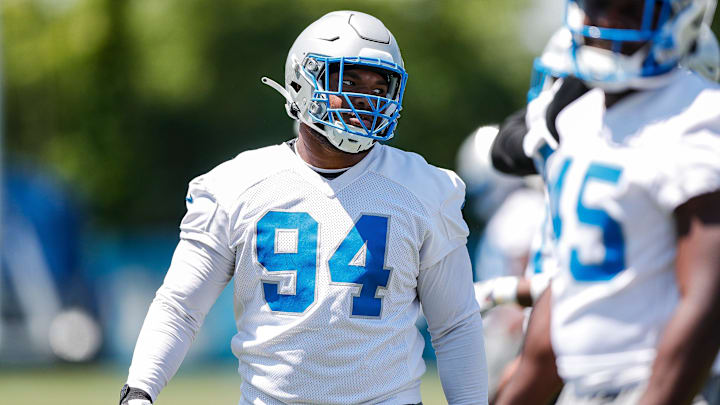 Detroit Lions defensive lineman Mekhi Wingo (94) practices during OTAs at Detroit Lions headquarters and practice facility in Allen Park on Tuesday, June 11, 2024.
