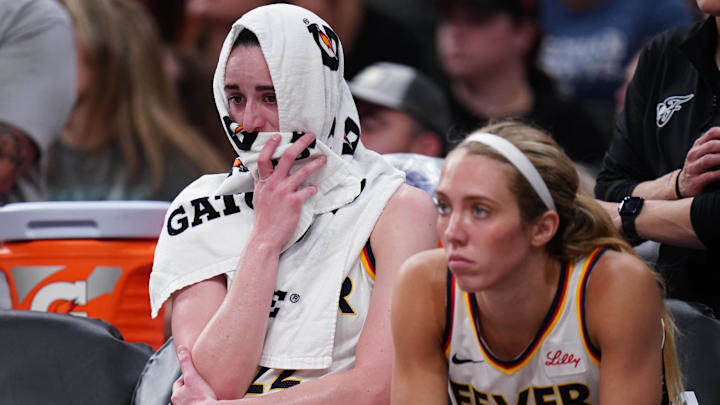 Jul 15, 2025; Boston, Massachusetts, USA; Indiana Fever guard Caitlin Clark (22) reacts on the bench after a play in the final second of the game against the Connecticut Sun at TD Garden. Mandatory Credit: David Butler II-Imagn Images