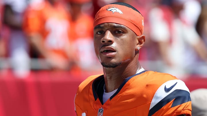 Sep 22, 2024; Tampa, Florida, USA;  Denver Broncos cornerback Pat Surtain II (2) works out prior to the game against the Tampa Bay Buccaneers at Raymond James Stadium. 