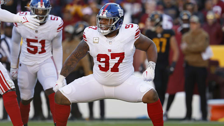 Nov 19, 2023; Landover, Maryland, USA; New York Giants defensive tackle Dexter Lawrence II (97) celebrates after a sack against the Washington Commanders during the second quarter at FedExField. 