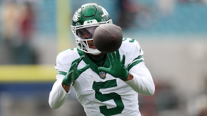 Dec 15, 2024; Jacksonville, Florida, USA;  New York Jets wide receiver Garrett Wilson (5) warms up before a game against the Jacksonville Jaguars at EverBank Stadium. Mandatory Credit: Nathan Ray Seebeck-Imagn Images