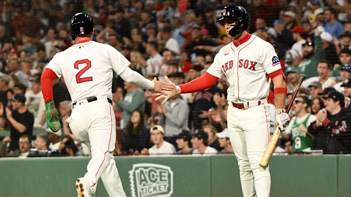 Sep 14, 2025; Boston, Massachusetts, USA; Boston Red Sox third baseman Alex Bregman (2) high-fives first baseman Romy Gonzalez (23) after scoring a run against the New York Yankees during the first inning at Fenway Park. Mandatory Credit: Brian Fluharty-Imagn Images Sep 14, 2025; Boston, Massachusetts, USA; Boston Red Sox third baseman Alex Bregman (2) high-fives first baseman Romy Gonzalez (23) after scoring a run against the New York Yankees during the first inning at Fenway Park. Mandatory Credit: Brian Fluharty-Imagn Images