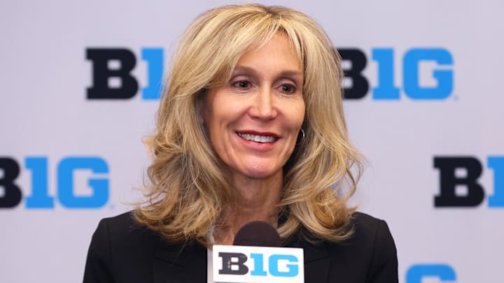 Oct 2, 2024; Rosemont, IL, USA; Washington head coach Tina Langley takes a question at the podium during the 2024 Big Ten Womenís Basketball media day at Donald E. Stephens Convention Center. Mandatory Credit: Melissa Tamez-Imagn Images