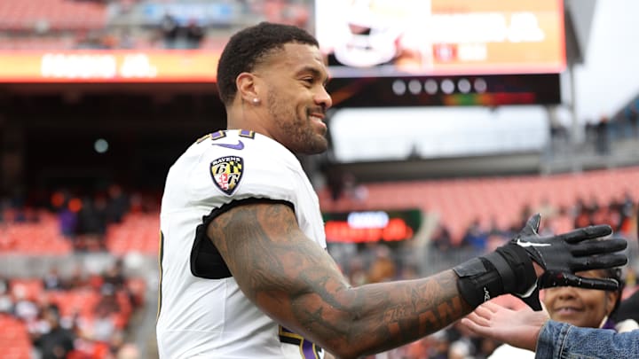 Nov 16, 2025; Cleveland, Ohio, USA; Baltimore Ravens linebacker Dre'Mont Jones (41) greets fans prior to a game against the Cleveland Browns at Huntington Bank Field. Mandatory Credit: Scott Galvin-Imagn Images