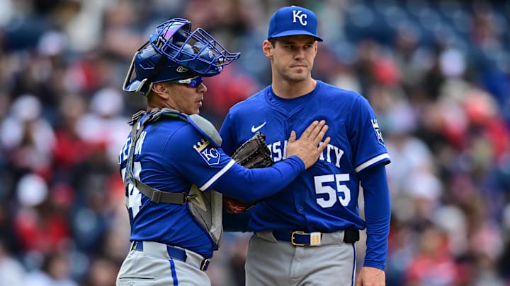 Apr 13, 2025; Cleveland, Ohio, USA; Kansas City Royals starting pitcher Cole Ragans (55) is congratulated by catcher Freddy Fermin (34) before being removed from the game in the eighth inning against the Cleveland Guardians at Progressive Field. Mandatory Credit: David Dermer-Imagn Images