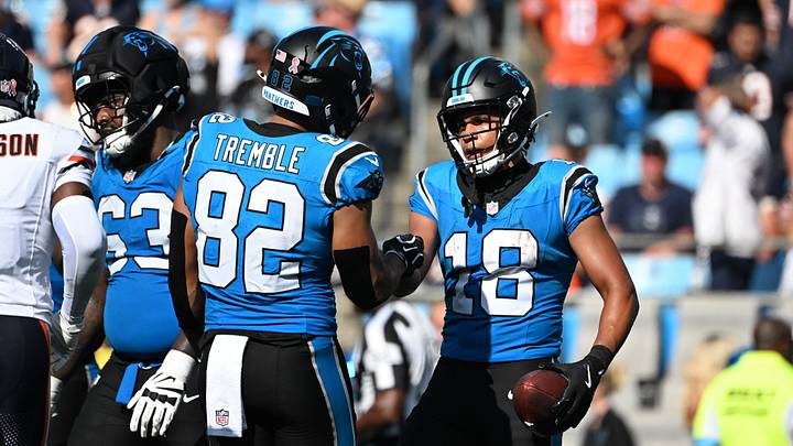 Carolina Panthers wide receiver Jalen Coker (18) celebrates with tight end Tommy Tremble Carolina Panthers wide receiver Jalen Coker (18) celebrates with tight end Tommy Tremble