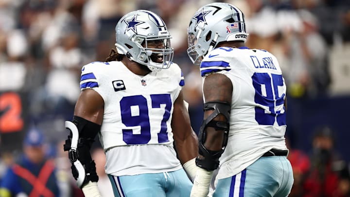 Dallas Cowboys DT Osa Odighizuwa celebrates with DT Kenny Clark after a play against the New York Giants.