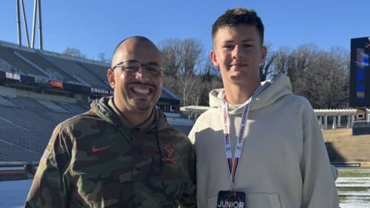 2027 Virginia QB Luke Gaither with Cavaliers head coach Tony Elliot.