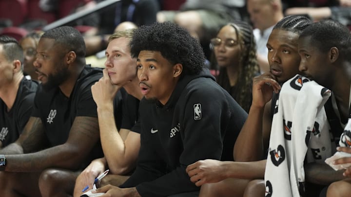 Jul 10, 2025; Las Vegas, NV, USA; San Antonio Spurs guard Dylan Harper (2) looks on from the bench during the fourth quarter of their game against the Philadelphia 76ers  at Thomas & Mack Center. Mandatory Credit: Candice Ward-Imagn Images