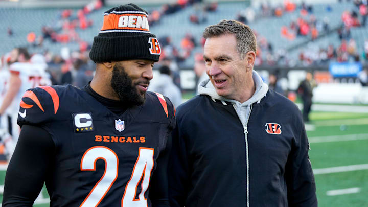 Cincinnati Bengals defensive coordinator Lou Anarumo smiles as he walks for the locker room with safety Vonn Bell (24) after the fourth quarter of the NFL Week 16 game between the Cincinnati Bengals and the Cleveland Browns at Paycor Stadium in downtown Cincinnati on Sunday, Dec. 22, 2024. The Bengals won 24-16.