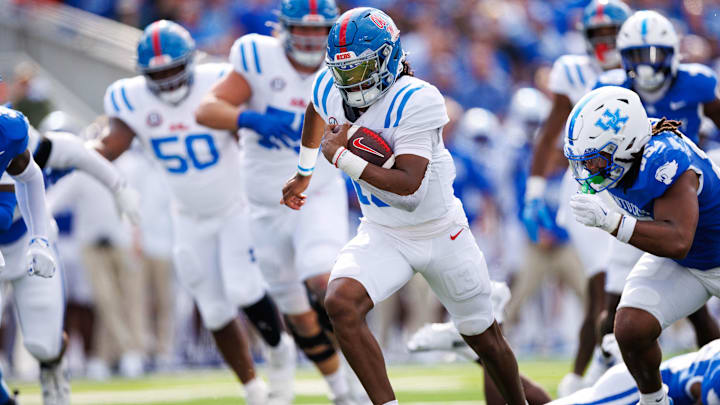 Sep 6, 2025; Lexington, Kentucky, USA; Mississippi Rebels quarterback Austin Simmons (13) runs the ball during the second quarter against the Kentucky Wildcats at Kroger Field. Mandatory Credit: Jordan Prather-Imagn Images Sep 6, 2025; Lexington, Kentucky, USA; Mississippi Rebels quarterback Austin Simmons (13) runs the ball during the second quarter against the Kentucky Wildcats at Kroger Field. Mandatory Credit: Jordan Prather-Imagn Images