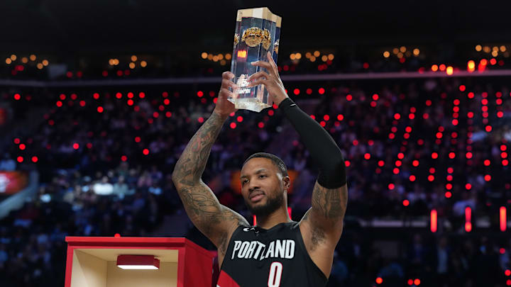 Feb 14, 2026; Los Angeles, CA, USA; Feb 14, 2026; Los Angeles, CA, USA; Portland Trail Blazers guard Damian Lillard (0) holds the trophy after winning the three point contest during the 2026 NBA All Star Saturday Night at Intuit Dome. Mandatory Credit: Kirby Lee-Imagn Images