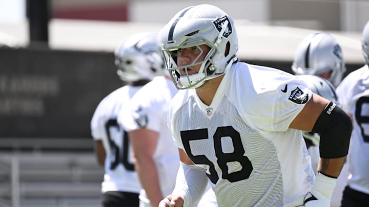 Jun 11, 2025; Henderson, NV, USA; Las Vegas Raiders guard Jackson Powers-Johnson (58) runs through a drill during Las Vegas Raiders Minicamp at Intermountain Health Performance Center. Mandatory Credit: Candice Ward-Imagn Images