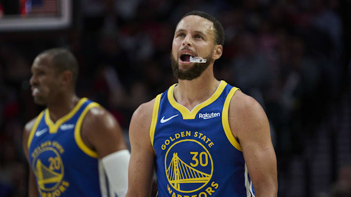 Golden State Warriors guard Stephen Curry (30) looks up a the scoreboard during the second half against the Portland Trail Blazers at Moda Center. 