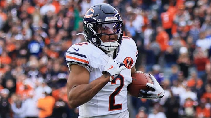 Nov 2, 2025; Cincinnati, Ohio, USA; Chicago Bears wide receiver DJ Moore (2) runs with the ball against the Cincinnati Bengals during the fourth quarter at Paycor Stadium. Mandatory Credit: Katie Stratman-Imagn Images