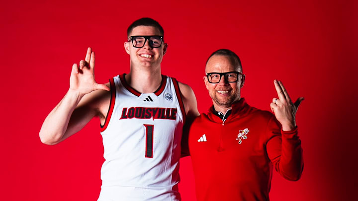 Former Virginia guard Isaac McKneely and Louisville head coach Pat Kelsey Former Virginia guard Isaac McKneely and Louisville head coach Pat Kelsey