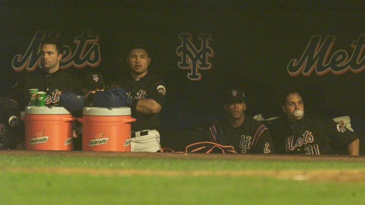 Oct 25, 2000; New York, NY, USA; Mets players looks dejected in dugout during 9th inning, from left: Todd Zeile, Benny Agbayani, Pat Mahomes, Mike Piazza. Mandatory Credit: Thomas E. Franklin/The Record-USA TODAY NETWORK Oct 25, 2000; New York, NY, USA; Mets players looks dejected in dugout during 9th inning, from left: Todd Zeile, Benny Agbayani, Pat Mahomes, Mike Piazza. Mandatory Credit: Thomas E. Franklin/The Record-USA TODAY NETWORK