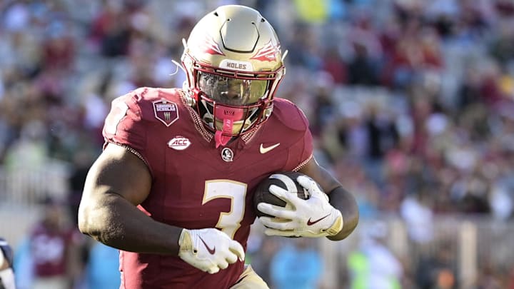 Nov 23, 2024; Tallahassee, Florida, USA; Florida State Seminoles running back Kam Davis (3) runs the ball during the second half of the game against the Charleston Southern Buccaneers at Doak S. Campbell Stadium. Mandatory Credit: Melina Myers-Imagn Images