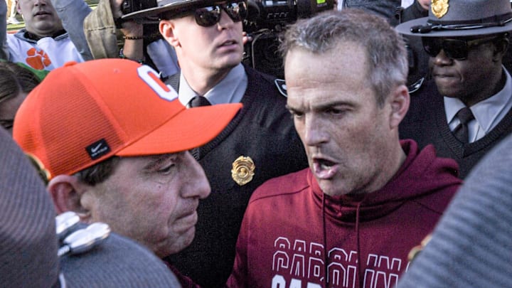 Nov 30, 2024; Clemson, South Carolina, USA; Clemson head coach Dabo Swinney and South Carolina Head Coach Shane Beamer talk after the game at Memorial Stadium. Mandatory Credit: Ken Ruinard-Imagn Images Nov 30, 2024; Clemson, South Carolina, USA; Clemson head coach Dabo Swinney and South Carolina Head Coach Shane Beamer talk after the game at Memorial Stadium. Mandatory Credit: Ken Ruinard-Imagn Images