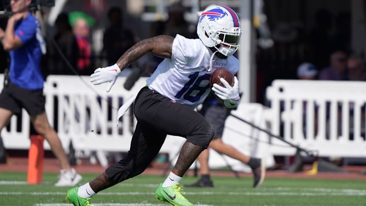 Buffalo Bills wide receiver Elijah Moore runs up field with the ball during the Buffalo Bills training camp. Buffalo Bills wide receiver Elijah Moore runs up field with the ball during the Buffalo Bills training camp.