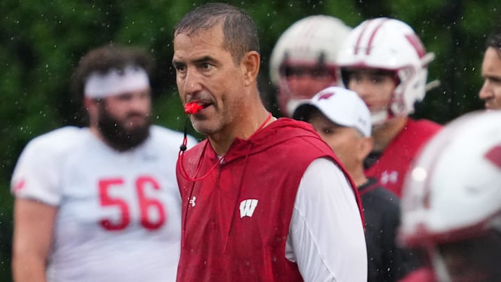 Wisconsin football head coach Luke Fickell observes practice Wednesday, July 30, 2025, at Ralph E. Davis Pioneer Stadium in Platteville, Wisconsin.