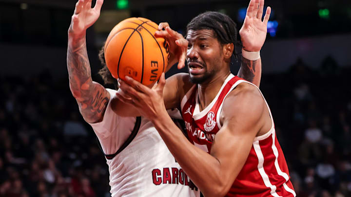 Jan 20, 2026; Columbia, South Carolina, USA; Oklahoma Sooners forward Mohamed Wague (5) and South Carolina Gamecocks forward Myles Stute (10) battle for a loose ball in the second half at Colonial Life Arena. Mandatory Credit: Jeff Blake-Imagn Images