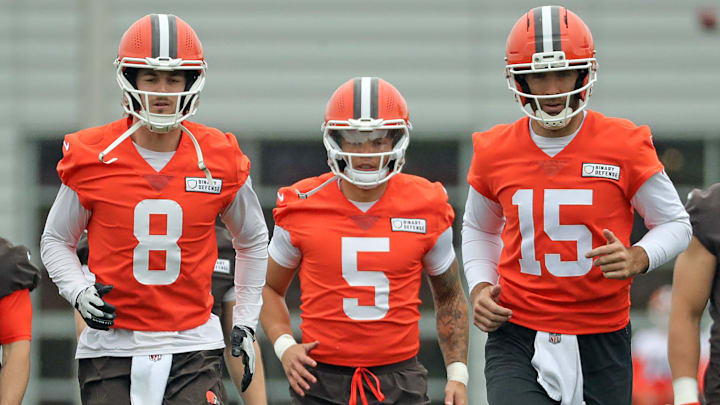 Cleveland Browns quarterbacks Kenny Pickett, left, Dillon Gabriel, center, and Joe Flacco warm up during an practice at the Browns training facility May 28, 2025, in Berea, Ohio. Cleveland Browns quarterbacks Kenny Pickett, left, Dillon Gabriel, center, and Joe Flacco warm up during an practice at the Browns training facility May 28, 2025, in Berea, Ohio.