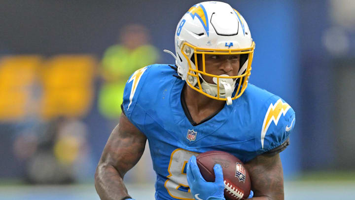 Sep 21, 2025; Inglewood, California, USA;  Los Angeles Chargers running back Omarion Hampton (8) runs for a first down in the second half against the Denver Broncos at SoFi Stadium. 