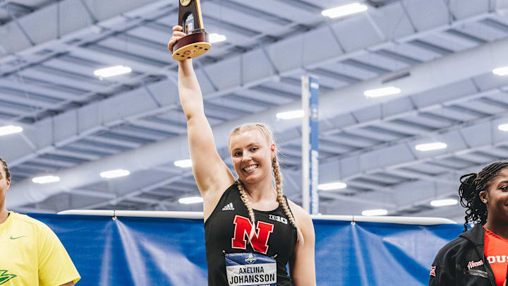 Nebraska thrower Axelina Johansson holds up her trophy for winning the NCAA Women's Indoor Shot Put National Championship on March 15, 2025.