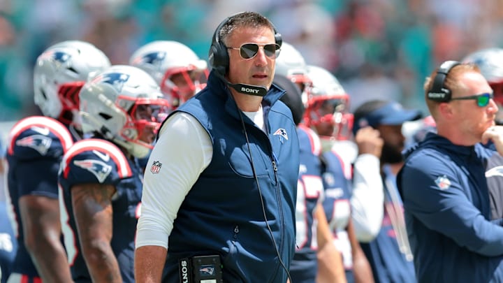 Sep 14, 2025; Miami Gardens, Florida, USA; New England Patriots head coach Mike Vrabel watches from the sideline against the Miami Dolphins during the first quarter at Hard Rock Stadium. Mandatory Credit: Sam Navarro-Imagn Images Sep 14, 2025; Miami Gardens, Florida, USA; New England Patriots head coach Mike Vrabel watches from the sideline against the Miami Dolphins during the first quarter at Hard Rock Stadium. Mandatory Credit: Sam Navarro-Imagn Images