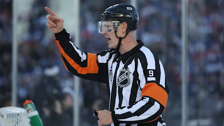 Jan 1, 2017; Toronto, Ontario, CAN; NHL referee Dan O   Rourke (9) during the Detroit Red Wings game