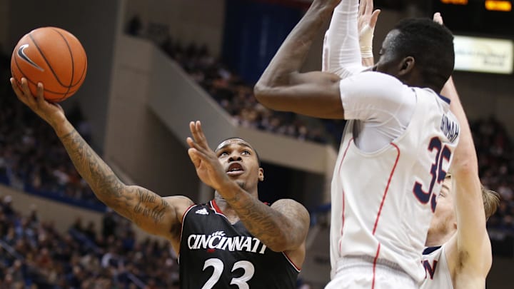 Mar 1, 2014; Hartford, CT, USA; Cincinnati Bearcats guard Sean Kilpatrick (23) shoots against Connecticut Huskies center Amida Brimah (35) in the second half at XL Center. UConn defeated the Cincinnati Bearcats 51-45. Mandatory Credit: David Butler II-Imagn Images Mar 1, 2014; Hartford, CT, USA; Cincinnati Bearcats guard Sean Kilpatrick (23) shoots against Connecticut Huskies center Amida Brimah (35) in the second half at XL Center. UConn defeated the Cincinnati Bearcats 51-45. Mandatory Credit: David Butler II-Imagn Images