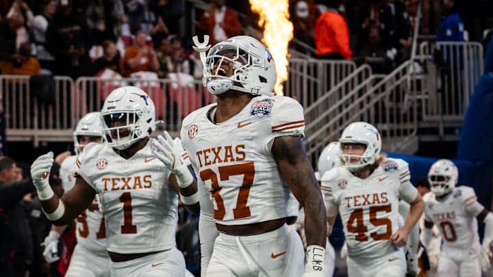 Texas Longhorns linebacker Morice Blackwell Jr. (37) runs out with his team as the Texas Longhorns prepare to play the Arizona State Sun Devils in the Peach Bowl College Football Playoff quarterfinal at Mercedes-Benz Stadium in Atlanta, Georgia, Jan. 1, 2025.