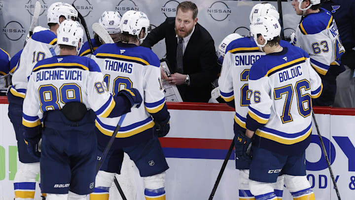 Apr 7, 2025; Winnipeg, Manitoba, CAN; St. Louis Blues assistant coach Steve Ott talks to players during a time out against the Winnipeg Jets in the third period at Canada Life Centre. Mandatory Credit: James Carey Lauder-Imagn Images