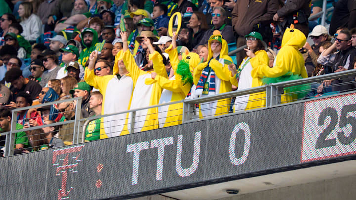 A flock of Ducks cheers as the Oregon Ducks take on the Texas Tech Red Raiders in the Orange Bowl on Jan. 1, 2026, at Hard Rock Stadium in Miami, Florida. A flock of Ducks cheers as the Oregon Ducks take on the Texas Tech Red Raiders in the Orange Bowl on Jan. 1, 2026, at Hard Rock Stadium in Miami, Florida.