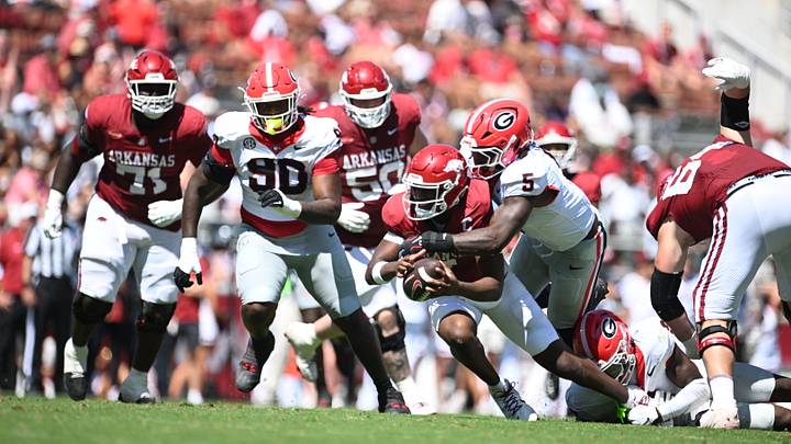 Georgia Bulldogs linebacker Raylen Wilson sacks Arkansas's quarterback in Georgia's big win over Razorbacks in Fayetteville, Arkansas. 9/19/2026 Georgia Bulldogs linebacker Raylen Wilson sacks Arkansas's quarterback in Georgia's big win over Razorbacks in Fayetteville, Arkansas. 9/19/2026