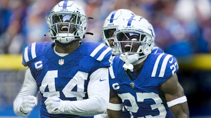 Indianapolis Colts linebacker Zaire Franklin (44) and Indianapolis Colts cornerback Kenny Moore II (23) celebrate after a tackle on Tennessee Titans quarterback Ryan Tannehill (17) on Sunday, Oct. 2, 2022, during a game against the Tennessee Titans at Lucas Oil Stadium in Indianapolis.