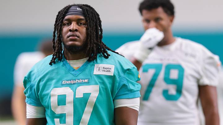 Miami Dolphins defensive lineman Keith Cooper Jr. (97) looks on during practice at the Baptist Health Training Complex. Miami Dolphins defensive lineman Keith Cooper Jr. (97) looks on during practice at the Baptist Health Training Complex.