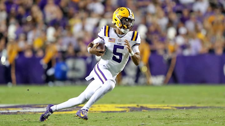 Oct 21, 2023; Baton Rouge, Louisiana, USA; LSU Tigers quarterback Jayden Daniels (5) runs with the