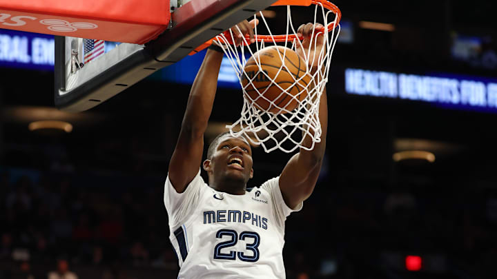 Oct 29, 2025; Phoenix, Arizona, USA; Memphis Grizzlies forward Cedric Coward (23) dunks the ball against the Phoenix Suns during the second half at the Mortgage Matchup Center. Mandatory Credit: Mark J. Rebilas-Imagn Images Oct 29, 2025; Phoenix, Arizona, USA; Memphis Grizzlies forward Cedric Coward (23) dunks the ball against the Phoenix Suns during the second half at the Mortgage Matchup Center. Mandatory Credit: Mark J. Rebilas-Imagn Images