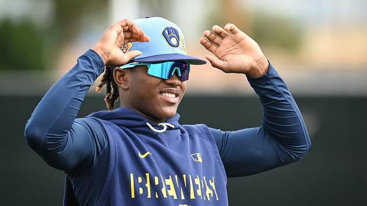 Milwaukee Brewers infielder Jesús Made (86) stretches during spring training workouts Monday, February 16, 2026, at American Family Fields of Phoenix in Phoenix, Arizona.