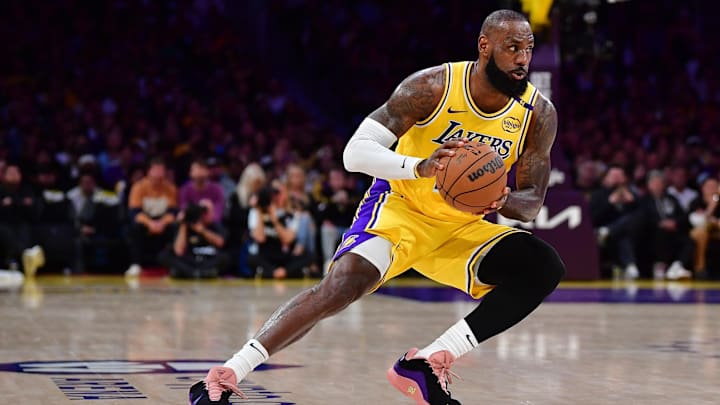 Apr 30, 2025; Los Angeles, California, USA: Los Angeles Lakers forward LeBron James (23) controls the ball against the Minnesota Timberwolves during the first half in game five of first round for the 2025 NBA Playoffs at Crypto.com Arena. Mandatory Credit: Gary A. Vasquez-Imagn Images