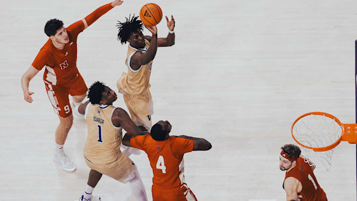 Zoom Diallo lets go of a shot against Nebraska at Alaska Airlines Arena. Zoom Diallo lets go of a shot against Nebraska at Alaska Airlines Arena.
