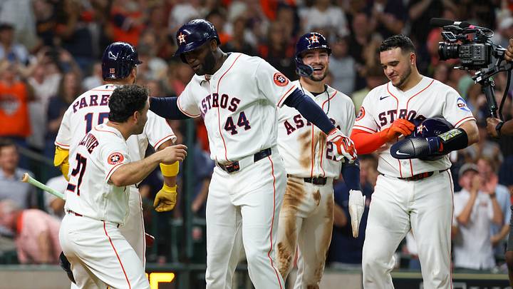 Houston Astros second baseman Jose Altuve (27) and teammates celebrate left fielder Yordan Alvarez's (44) grand slam home run. Houston Astros second baseman Jose Altuve (27) and teammates celebrate left fielder Yordan Alvarez's (44) grand slam home run.