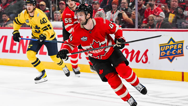 Canada defenseman Josh Morrissey (44) taking on Sweden during the 4 Nations Face-Off.