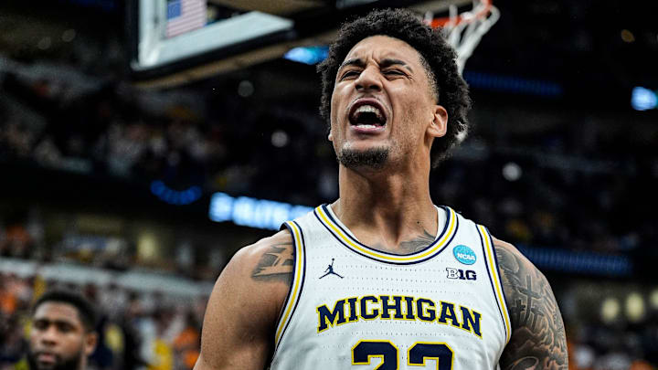 Michigan forward Yaxel Lendeborg (23) celebrates a dunk against Tennessee during the second half of the NCAA Tournament Elite Eight.