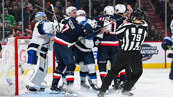 Feb 13, 2025; Montreal, Quebec, CAN; [Imagn Images direct customers only] Team Finland and Team USA players come together in the first period during a 4 Nations Face-Off ice hockey game at Bell Centre. Mandatory Credit: David Kirouac-Imagn Images