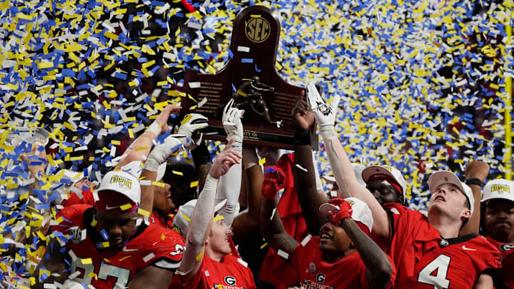 Georgia celebrates after the winning the SEC championship game against Texas in Atlanta, on Saturday, Dec. 7, 2024. Georgia won 22-19. Georgia celebrates after the winning the SEC championship game against Texas in Atlanta, on Saturday, Dec. 7, 2024. Georgia won 22-19.